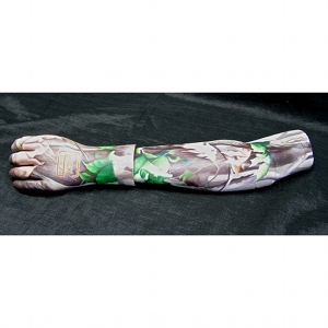 image: Prosthetic arm covering tattoo painting by Hudson Valley NY artist Katrie Arena.  hunting camo with glock logo.  Painted in 2012.